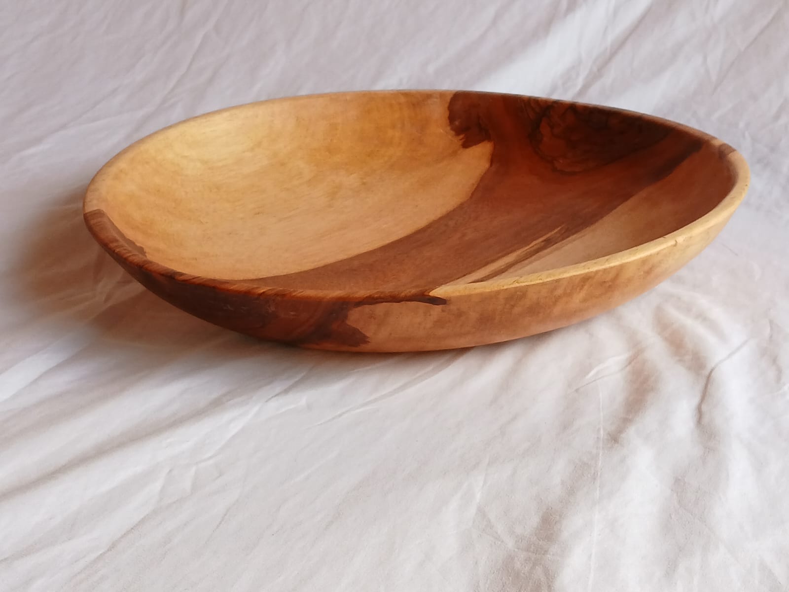 "Handcrafted 18 inch wood bowl with low textured design, farmhouse decor"