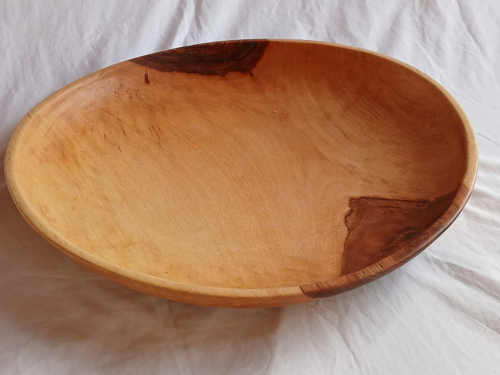 "21 inch extra large low textured wooden bowl, rustic serving and decor piece"
