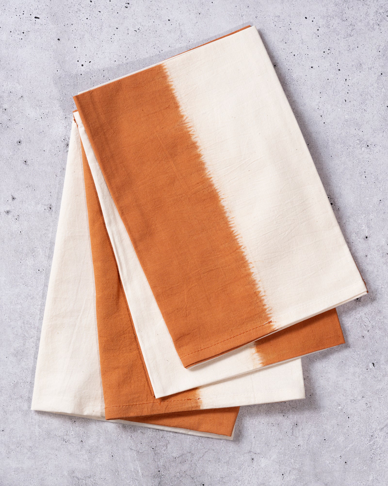 Amber ombré Shibori cotton napkin, hand-dyed artisanal table linen