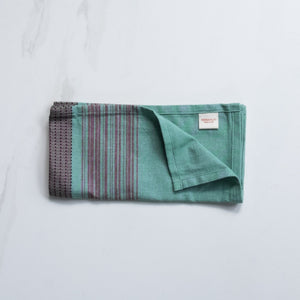 "Reusable cotton dinner napkins in teal and brown striped design"